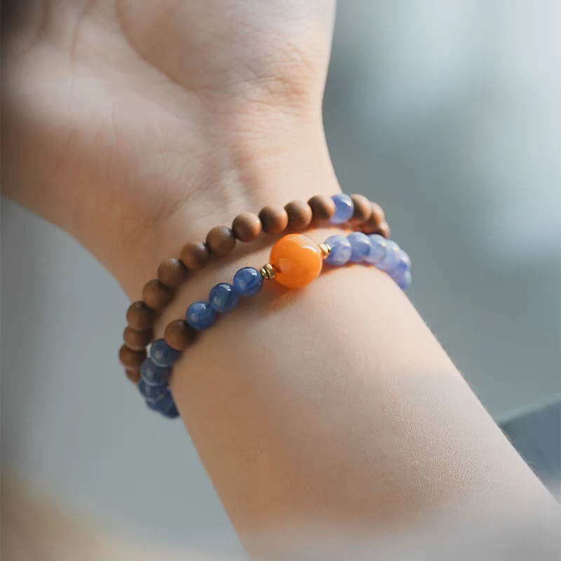 Layered zen bracelet on woman’s wrist