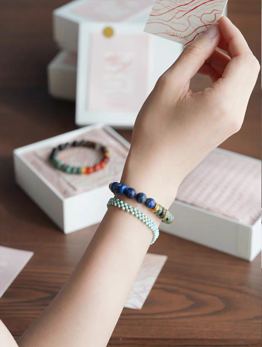 Handmade Earth & Sky Energy Bracelet in premium eco-friendly packaging – Ideal for gifting with healing gemstones and gold accents.