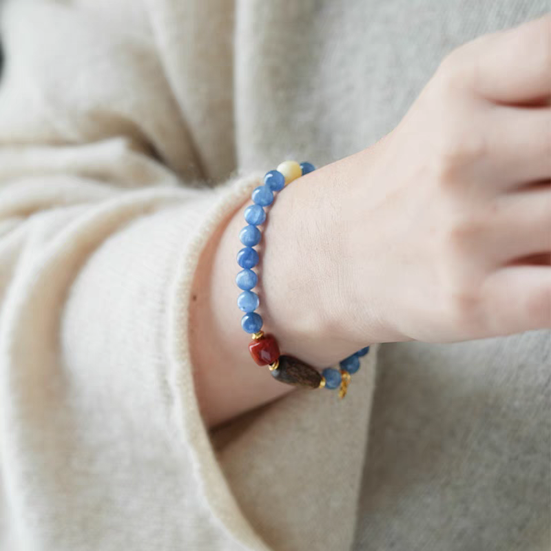 Close-up view of Blue Aventurine and Yellow Jade beads in the natural stone bracelet, with S925 Silver accents for an elegant touch.