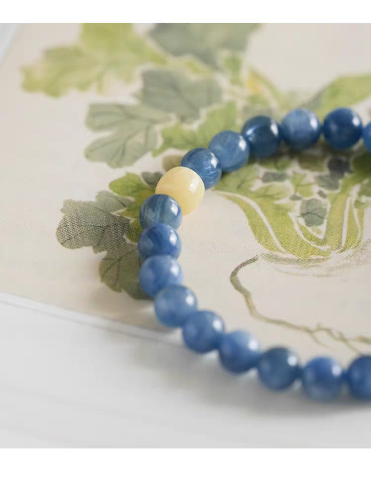 Close-up view of Blue Aventurine and Yellow Jade beads in the natural stone bracelet, with S925 Silver accents for an elegant touch.