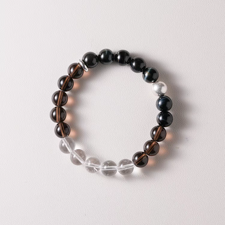 Close-up of clear crystal beads in the healing bracelet, promoting clarity and spiritual healing