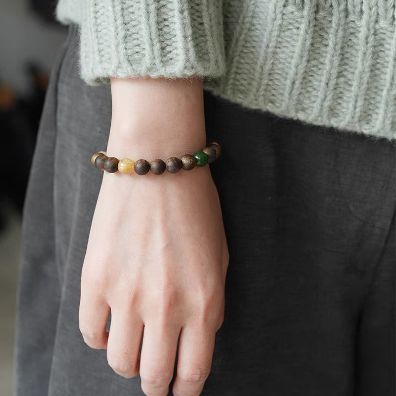 Kunling Natural Gemstone Bracelet Worn on Wrist, Showing Beautiful Wooden and Crystal Beads for Positive Energy