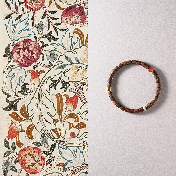 Qiū Shí Xù Feng Shui Bracelet featuring 20-year aged agarwood, fossilized mammoth ivory, and red jasper beads for seasonal balance