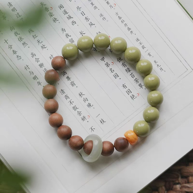 Close-Up of Yanyan Handmade Natural Stone Bracelet Featuring Green Aventurine, Wood, and Amber Accents